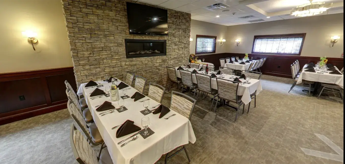 Gala event room set with long banquet tables