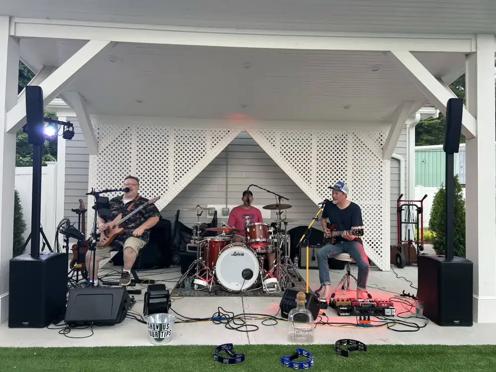 A live band playing on the outdoor stage